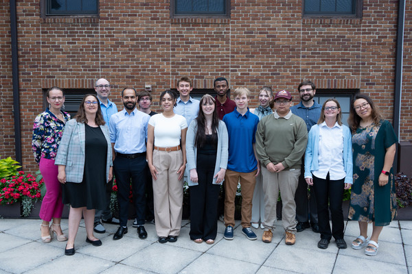 Representation of the achievement named 'Nine Student Undergraduate Research Fellows Present Summer Projects'.