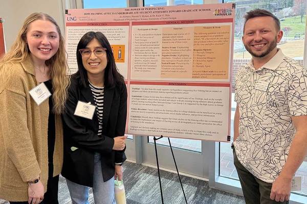 Representation of the achievement named 'Students' research looks at impact of grad school framing'.