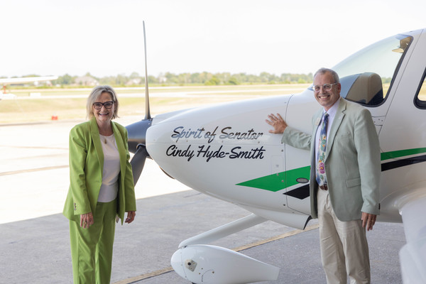 Senator Cindy Hyde-Smith (L) and DSU President Dr. Daniel J. Ennis with the newly christened Spirit of Senator Cindy Hyde-Smith.