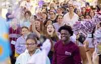 Students wearing SUNY Potsdam gear cheer during the First-Year Funnel event.
