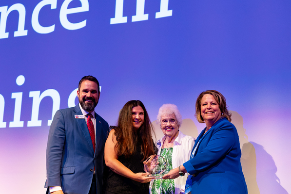 Northwest's President Dr. Michael J. Heindl (left), Sandy Grisham Excellence in Teaching Award recipient and Science Instructor Lisa Strong (second from left), alongside Sandy Grisham (second from right) and Northwest's Vice President of Instruction Dr. Ginger Robbins (right). Photo by Carly Fox
