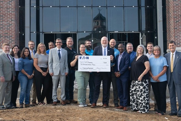 Representatives from Lee University and Eaton gather on Aug. 13 following the presentation of Eaton’s $10,000 grant in support of Lee’s School of Engineering. From left, Dr. Blayne Carroll, dean of the SOE; Vanessa Hammond, vice president for University Relations; Sanika Sathe, Kelly Horton, Rikki Singletary, Jim McCoy, Amanda Lavallee, Dallas Bostian, and Ben Burrell of Eaton; Shawn Williams, Lee machine shop manager; Dr. Phil Cook, Lee president; Dr. Andrew Ejenakevwe, Dr. Michael Franklin, and Dr. Marcie Williams of Lee; Seth Goudzwar and Angie Sewell of Eaton; and Dr. Paul Conn, Lee chancellor. 