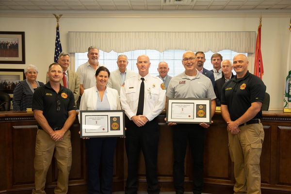 Cleveland Fire Chief Chris Bates is pictured with Lee University faculty members Dr. Racheal Lawler and Dr. Mike Iosia following the presentation of Civilian Awards recognizing their contributions to the health and well-being of Cleveland firefighters. Also pictured are members of the Cleveland Fire Department, Cleveland City Council, and Mayor Kevin Brooks.