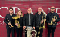The Potsdam Brass Quintet poses at The Crane School of Music.