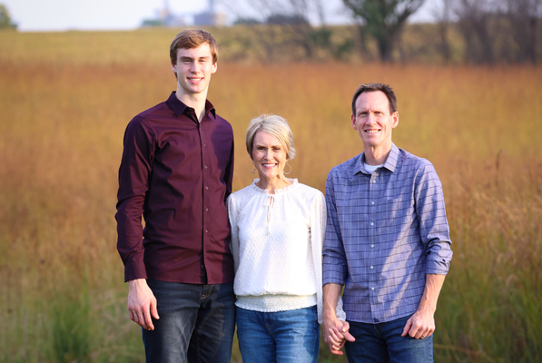 Two of the few people who knew about Karla Peiffer’s (middle) journey with CLL were her son, Vance (left), and husband, Mark, senior vice president and CFO at DMU (right).