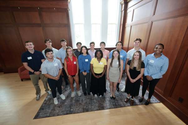 Ohio Wesleyan's newest Woltemade Economics and Business Fellows pose for a photo in the university's historic Merrick Hall.