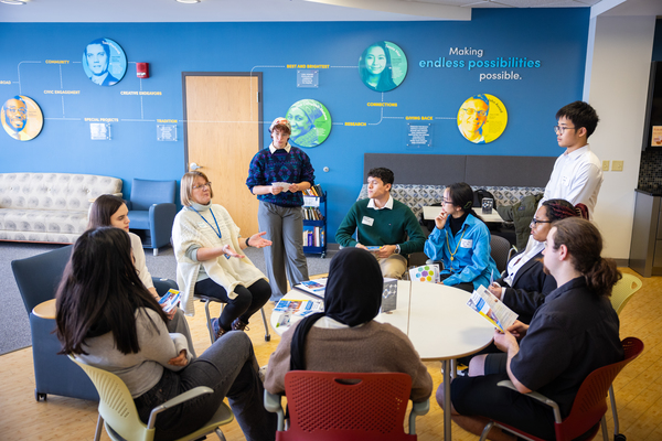 University at Buffalo Honors College students sitting in the school lounge.