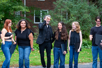 Chuck Lorre smiles while visiting with students during a visit to SUNY Potsdam.