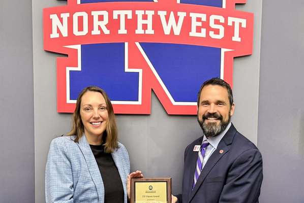 The University of Mississippi Director of DeSoto and Grenada Campuses gives Northwest Mississippi Community College President Dr. Michael J. Heindl the T.P. Vinson Award at Northwest on Sept. 3, 2026. Photo by University of Mississippi’s Marketing Specialist Joy Arwood.