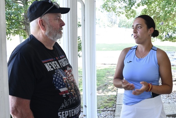 Columbia resident Glen Hunt talks to Lindsey Wilson University student Mariangeles Ortega Mateu '27 of Valencia, Spain, on Friday, Sept. 11, at a meet-and-greet for international student host families, held at the university's International Student Program House.