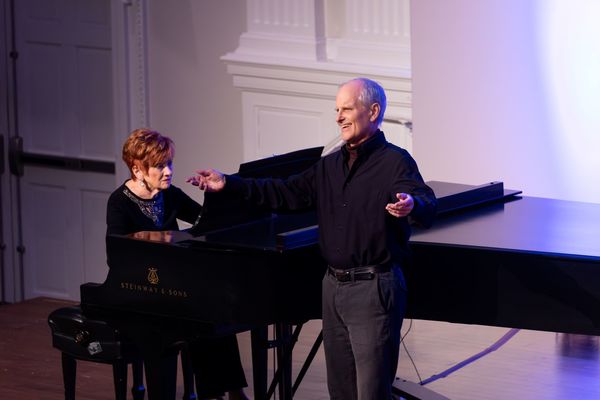 James Frost, accompanied by Mary Beth Wickes, is shown performing during the 2024 Faculty Gala.