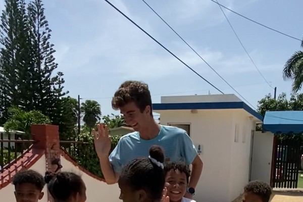 Will Meyers plays soccer with students at Saint Matthew School in La Romana, Dominican Republic. 