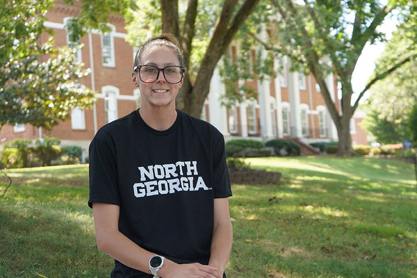Representation of the achievement named 'UNG student Davis wins swimming national titles'.