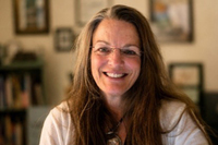 A headshot of Marjorie Lalor Reilly smiling.