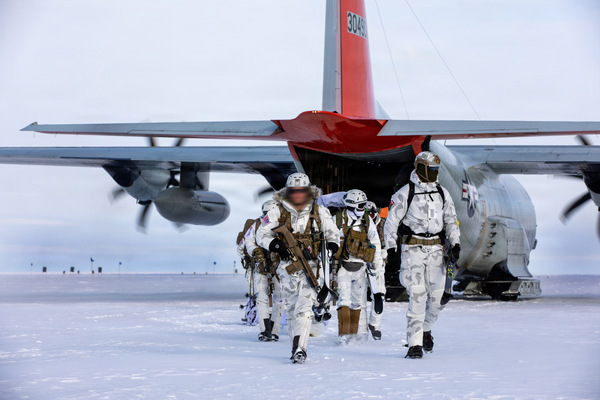 Army Special Forces Soldiers, known as Green Berets assigned to 10th Special Forces Group (Airborne) and Danish Special Operations Forces assigned to SIRIUS offload from a LC-130 “skibird” flown by Airmen of the New York Air National Guard's 109th Airlift Wing on Aug. 18, 2026, at Camp Raven, Greenland, as part of Operation Apex Indigo. U.S. Special Operations Command North operates in Greenland alongside Danish counterparts to evaluate basic survival, search and rescue, cold-weather mobility, and communications infrastructure operations in the harshest environment on Earth, ensuring U.S. SOF capability to survive and thrive under any circumstances. The 109th Airlift Wing, which flies  the only ski-equipped aircraft in the U.S. military supported  the mission. (U.S. Army Photo by Staff Sgt. Ashley Low) (This photo was altered for security purposes)