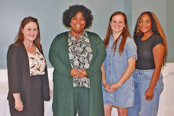 Recipients of the 2026 June S. Anderson Foundation Scholarships stand at the luncheon where they were awarded the grants.