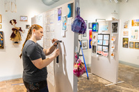 Nav Atkinson works on a show at SLC Arts.