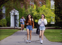 SUNY Potsdam students walk across the Quad on the first day of classes.