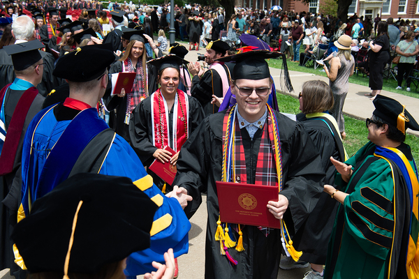 THE PERSONAL TOUCH: "Because we know our students well, we can spot opportunities that fit them," said Monmouth professor Chris Fasano.