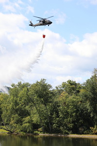 UH-60 dumping water.