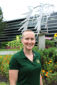 Elizabeth Hoyt poses and smiles on the SUNY Delhi campus.