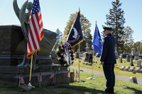 General salutes wreath at Chester Arthur gravesite.