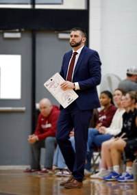 Michael Cotter coaches a game at SUNY Potsdam.