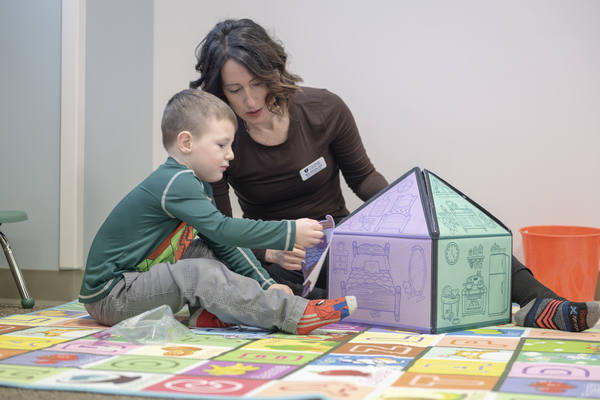 Beth O'Rourke, associate professor in Trine University's Doctor of Occupational Therapy, works with a child in the university's Brooks College of Health Professions (BCHP). The BCHP will host a special event highlighting careers and education in occupational therapy from 11 a.m. to 2 p.m. Tuesday, Oct. 20. (File photo by Dean Orewiler / Trine University)