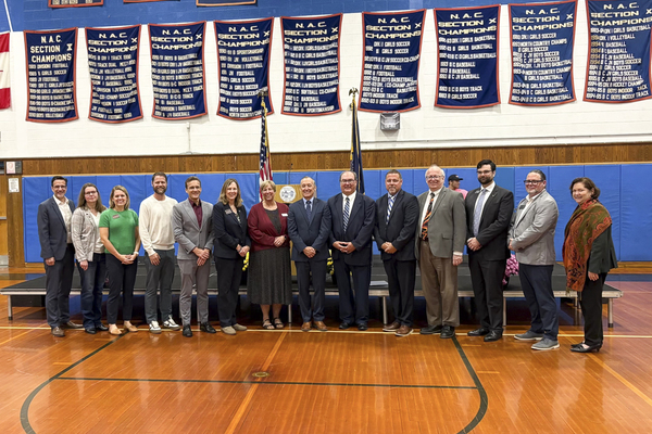 A group of college officials stand with founders of The Ogdensburg Promise at a special unveiling ceremony held Friday, Oct. 2. The Ogdensburg Promise is a program designed to help create new pathways to higher education for eligible graduates of Ogdensburg Free Academy. 
