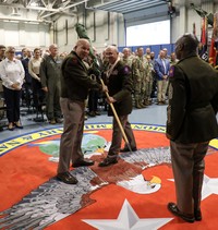 Passing a cased flag.