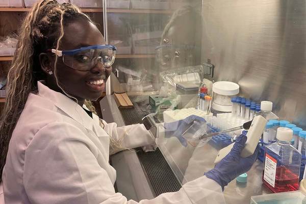 Rachel Ninson working in a research lab during her summer research internship.