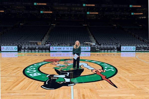 Communication major Bree Smith ’27 stands on the parquet at TD Garden in Boston during her Celtics internship.
