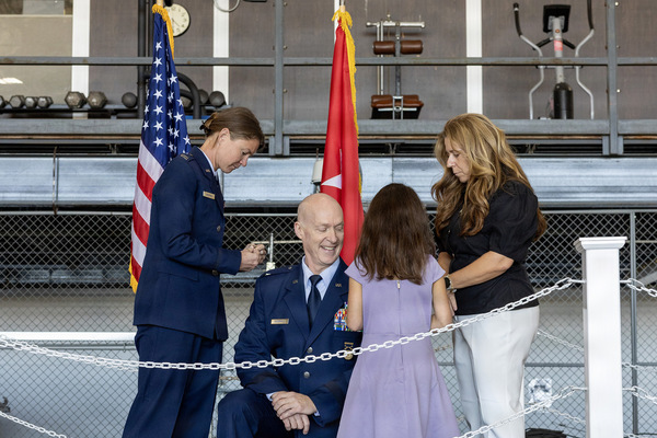 The family of U.S. Air National Guard Brig. Gen. Eric Underhill pin on his new rank during his promotion ceremony at Stratton Air National Guard Base, Scotia, N.Y., Oct. 3, 2026. U.S. Army National Guard Maj. Gen. Ray Shields, Adjutant General for the State of New York, presided over the ceremony marking Underhill’s promotion from colonel to brigadier general. (U.S. Air National Guard photo by Tech. Sgt. Madison Scaringe     