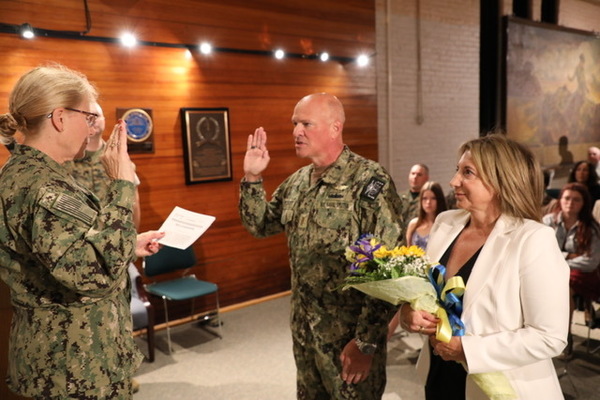 New York Naval Militia Chief Warrant Officer David Prescott is administered the oath of office by Rear Admiral MaryEtta Nolan, Commander of the New York Naval Militia, at the New York State Military Museum in Saratoga Springs, N.Y., on October 1, 2026. Prescott, a Glenmont resident, serves on the Unmanned Aerial Surveillance Unit, where he applies his extensive aviation experience to expand the unit’s operational capabilities and advance the Naval Militia's missions. (Photo by Lt. Col. Jean Marie Kratzer)