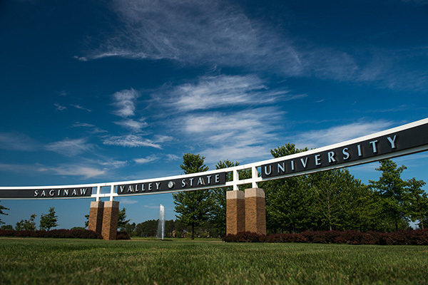 Arched entrance reading Saginaw Valley State University