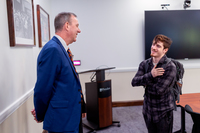 Scott Gray talks with SUNY Potsdam student Mike Weilert.