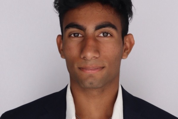 Professional headshot of a male college-aged student