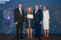 SRTC President and Board Chair pose with TCSG Commissioner and TCSG Director on stage at Leadership Conference
