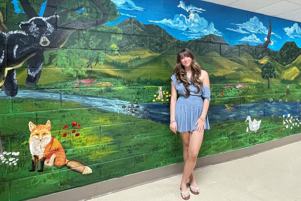 Representation of the achievement named 'UNG student Brown creates mural at Lumpkin senior center'.
