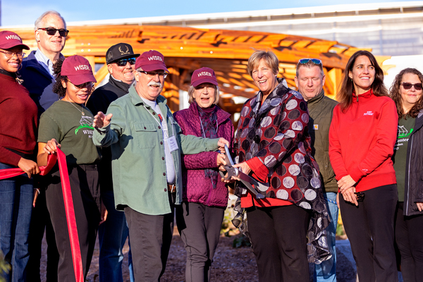 From left, Kendyll Mack ’28, State Senator Daniel Stec, Jasmine Crump ’27, project site manager Justin Blanchard, Robert “Bob” Wagner ’75, Wendy Lee Wagner (Hon. ’17), President Suzanne R. Smith, Bobby Dow of Dow Electric, Associate Professor Katherine Cleary and Instructional Support Specialist Rachel Wallace help to cut the ribbon for the WISER Botanical Garden at SUNY Potsdam (Photo credit: Elijah Blaunt '28).