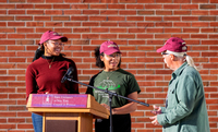 Students smile at donor Bob Wagner as they speak at a ceremony for the new WISER Botanical Garden.