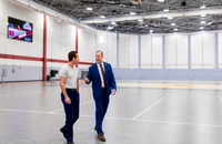 SUNY Potsdam Director of Athletics Mark Misiak (left) speaks with Assemblyman Scott Gray while viewing updates to the Maxcy Hall Fieldhouse.