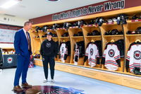 New York State Assemblyman Scott Gray tours the Potsdam Bears women’s hockey locker room with Head Coach Rachel Corbett.