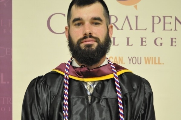 Representation of the achievement named 'Nathaniel Bomgardner receives a student award from Central Penn College'.