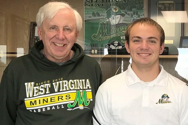 Representation of the achievement named 'Play ball! Trine student interns with WV team'.