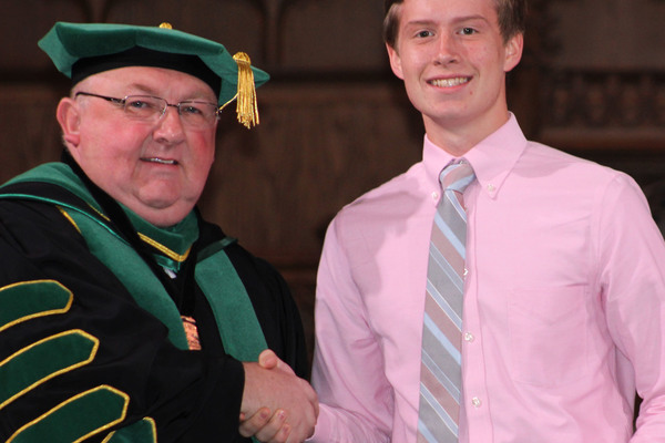 Representation of the achievement named 'Waggoner receives Award at CMU Convocation'.