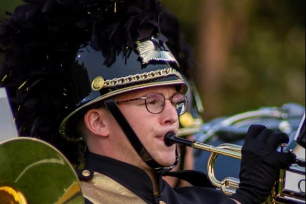 Representation of the achievement named 'Levi Lehman is band section leader at Manchester University'.