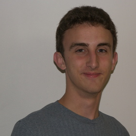 Andrew Perry’s headshot.