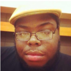 Aaron Moore’s headshot.