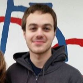 Thomas Coe’s headshot.